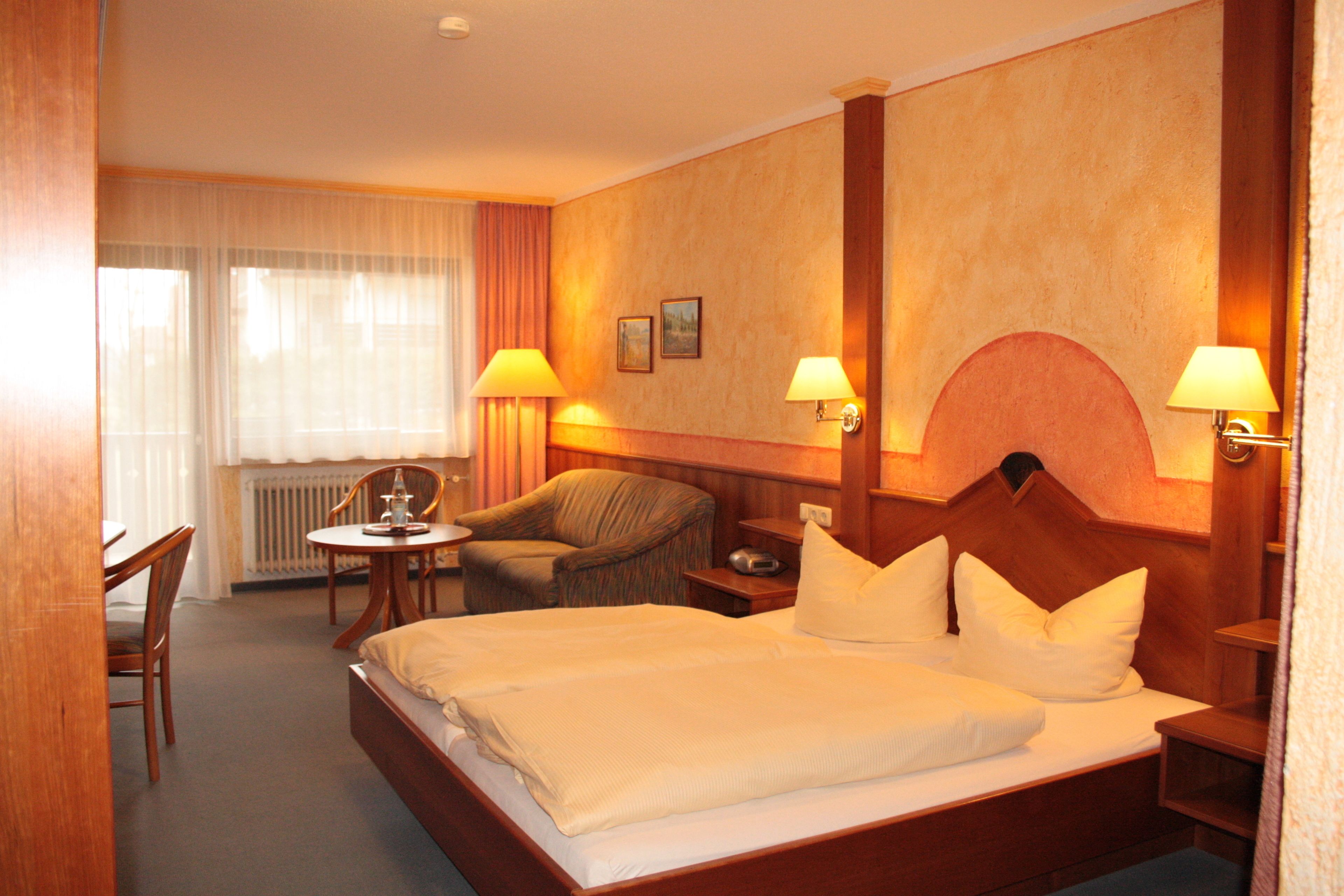 comfort room, 1 queen bed with sofa bed, balcony, garden view | individually decorated, individually furnished, desk, blackout curtains