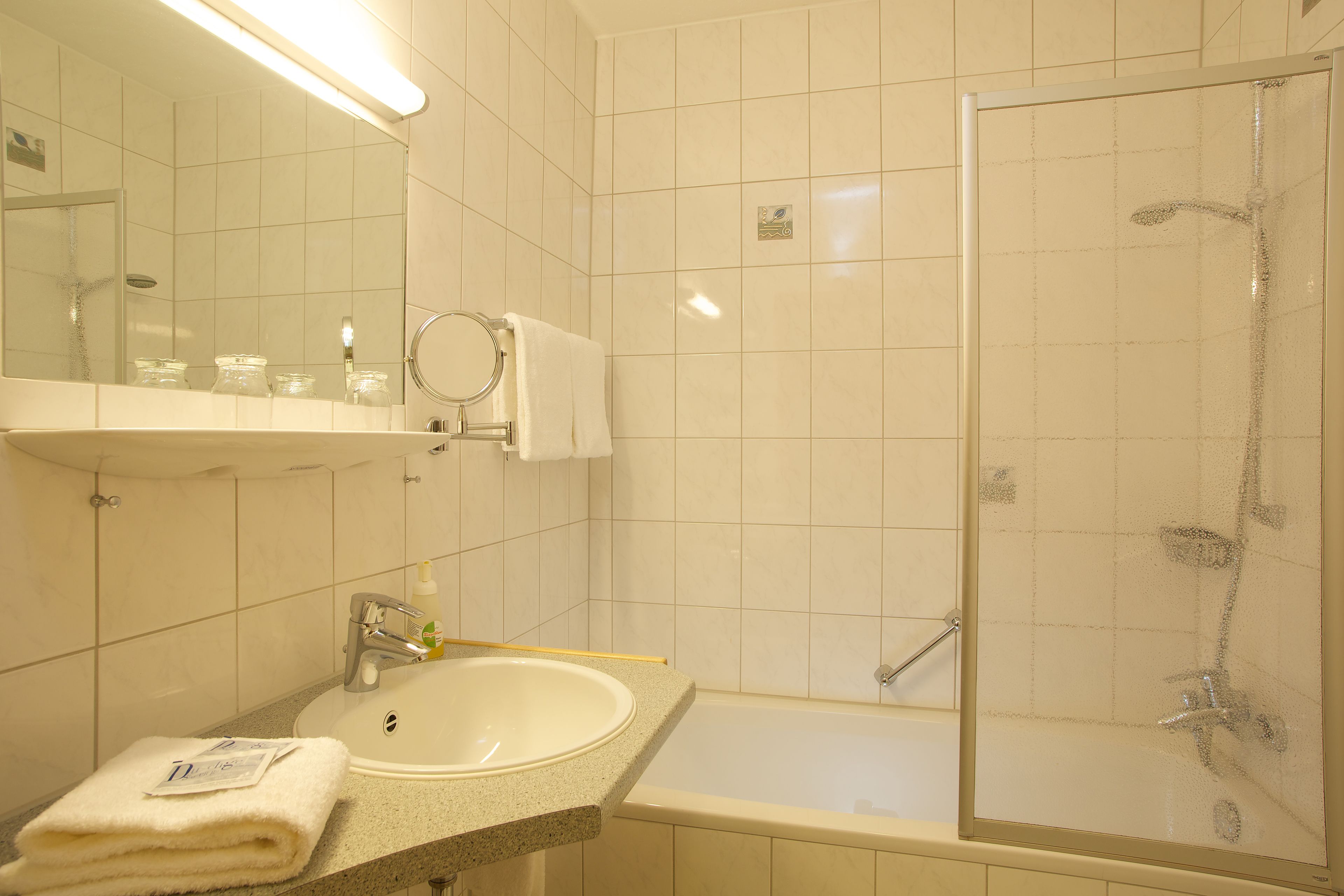 comfort room, 1 queen bed with sofa bed, balcony, garden view | bathroom | eco-friendly toiletries, hair dryer, towels