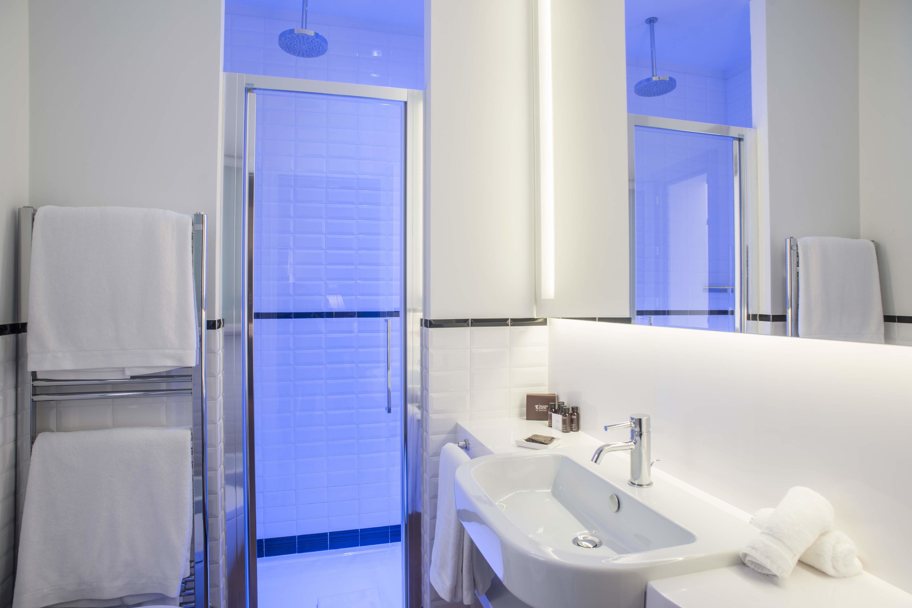 shower, rainfall showerhead, designer toiletries, hair dryer