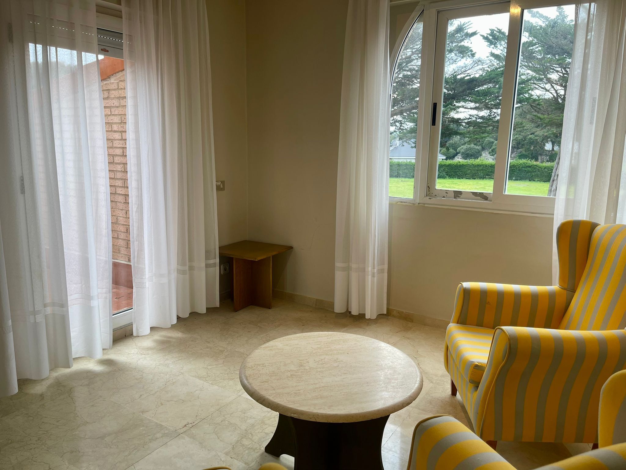 family room, multiple beds, balcony | living area | 25-inch flat-screen tv with satellite channels, tv