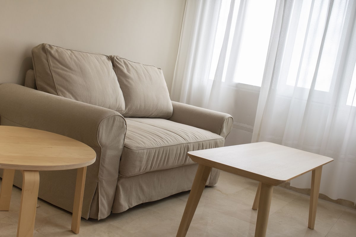 family room, multiple beds, balcony | living room | 25-inch flat-screen tv with satellite channels, tv