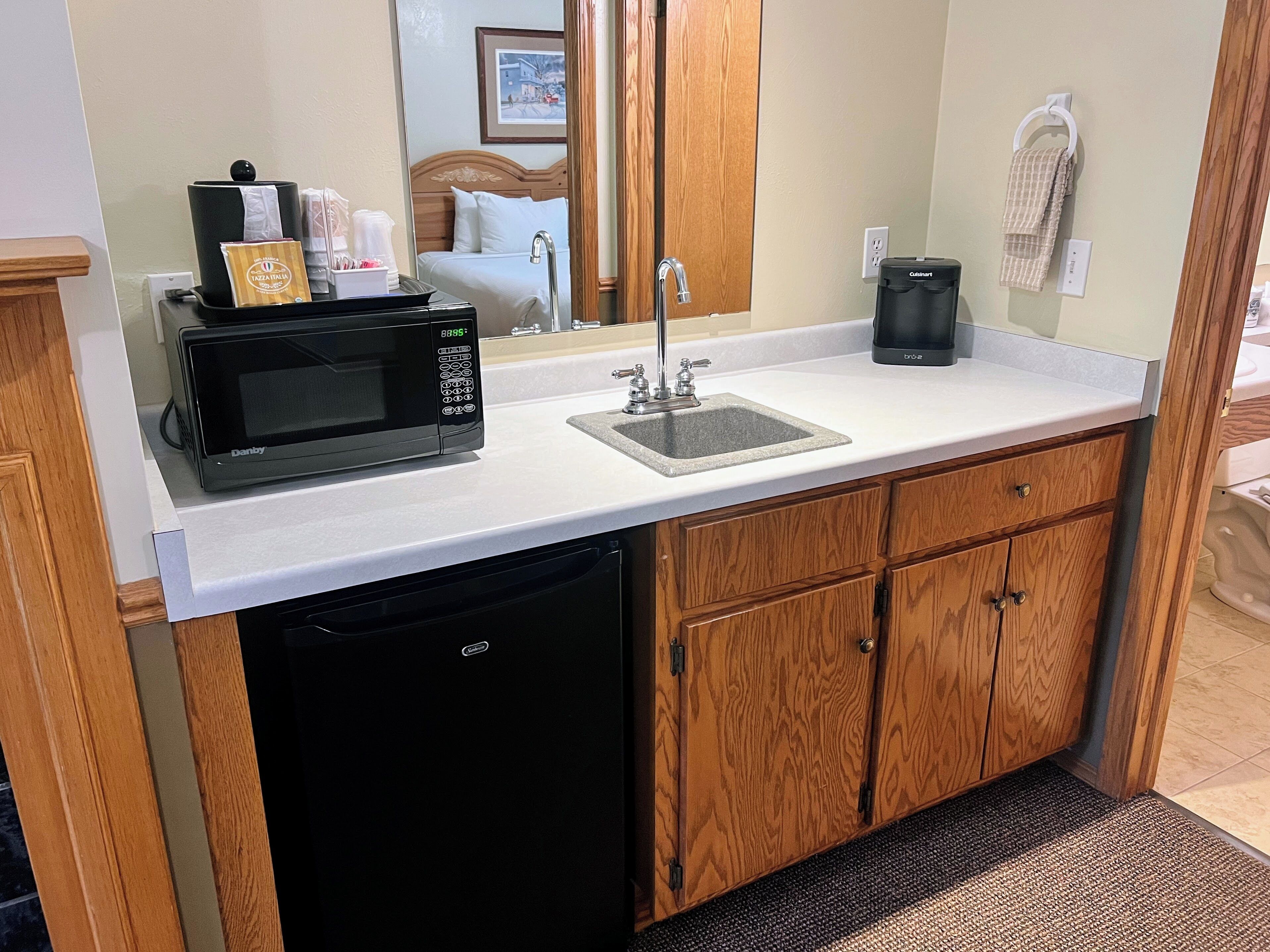 king suite, partial harbor view room on second floor only | mini fridge