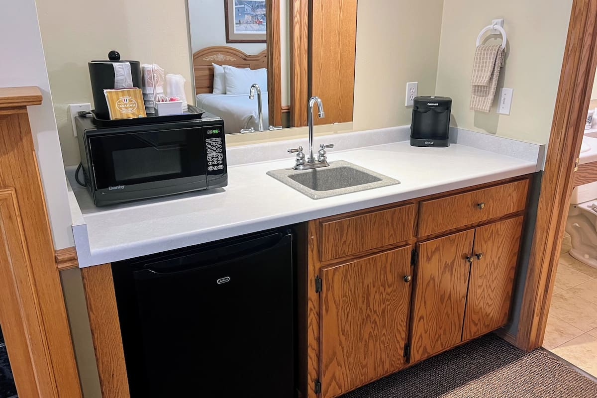 king suite, partial harbor view room on second floor only | mini fridge