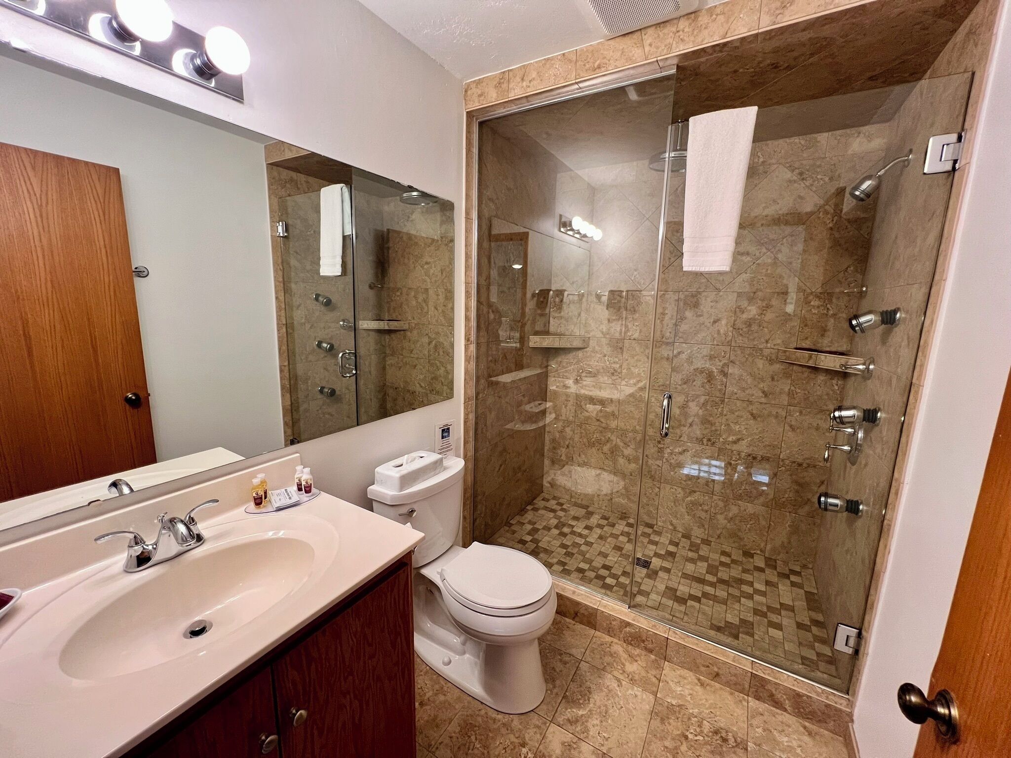 queen, partial harbor view, w/ rain shower & outdoor table,  first floor | bathroom | free toiletries, hair dryer, towels