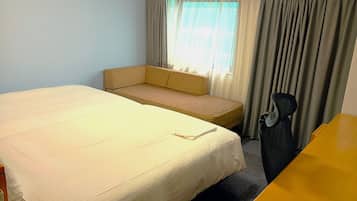 Economy Twin kamer | Een bureau, een laptopwerkplek, gratis wifi, beddengoed