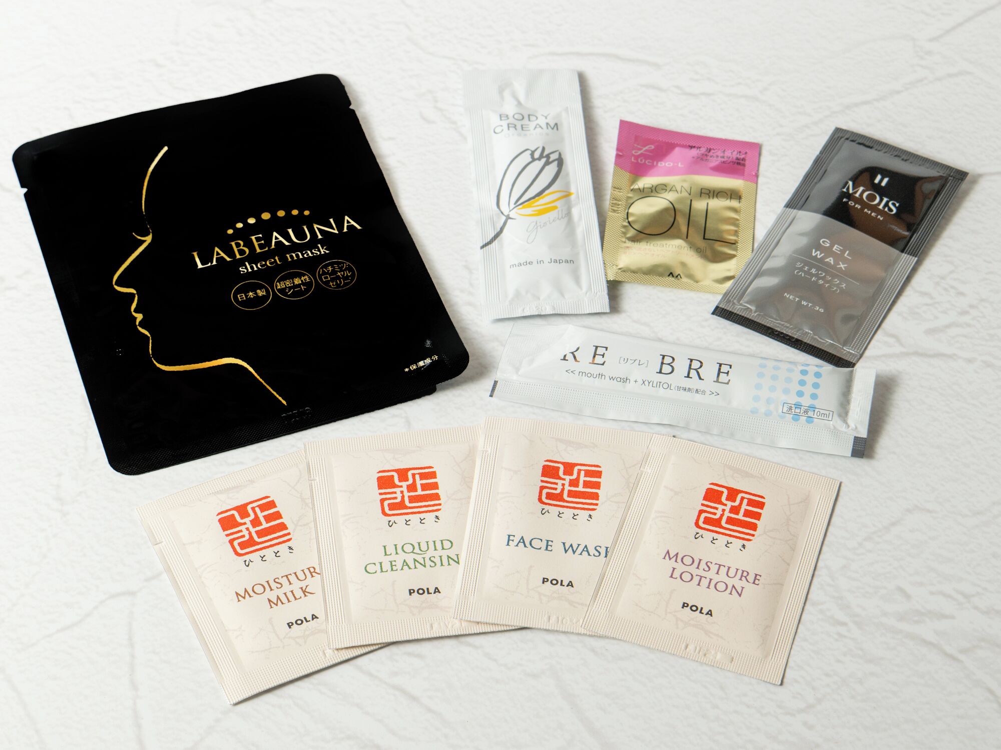 A variety of personal care products including a face wash, liquid cleanser, and a hair mask.