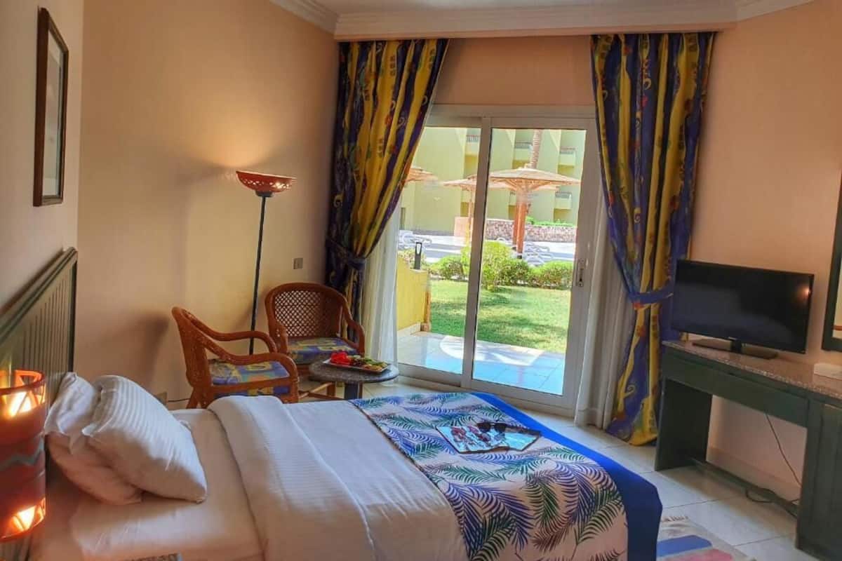 In-room safe, blackout curtains, iron/ironing board, bed sheets