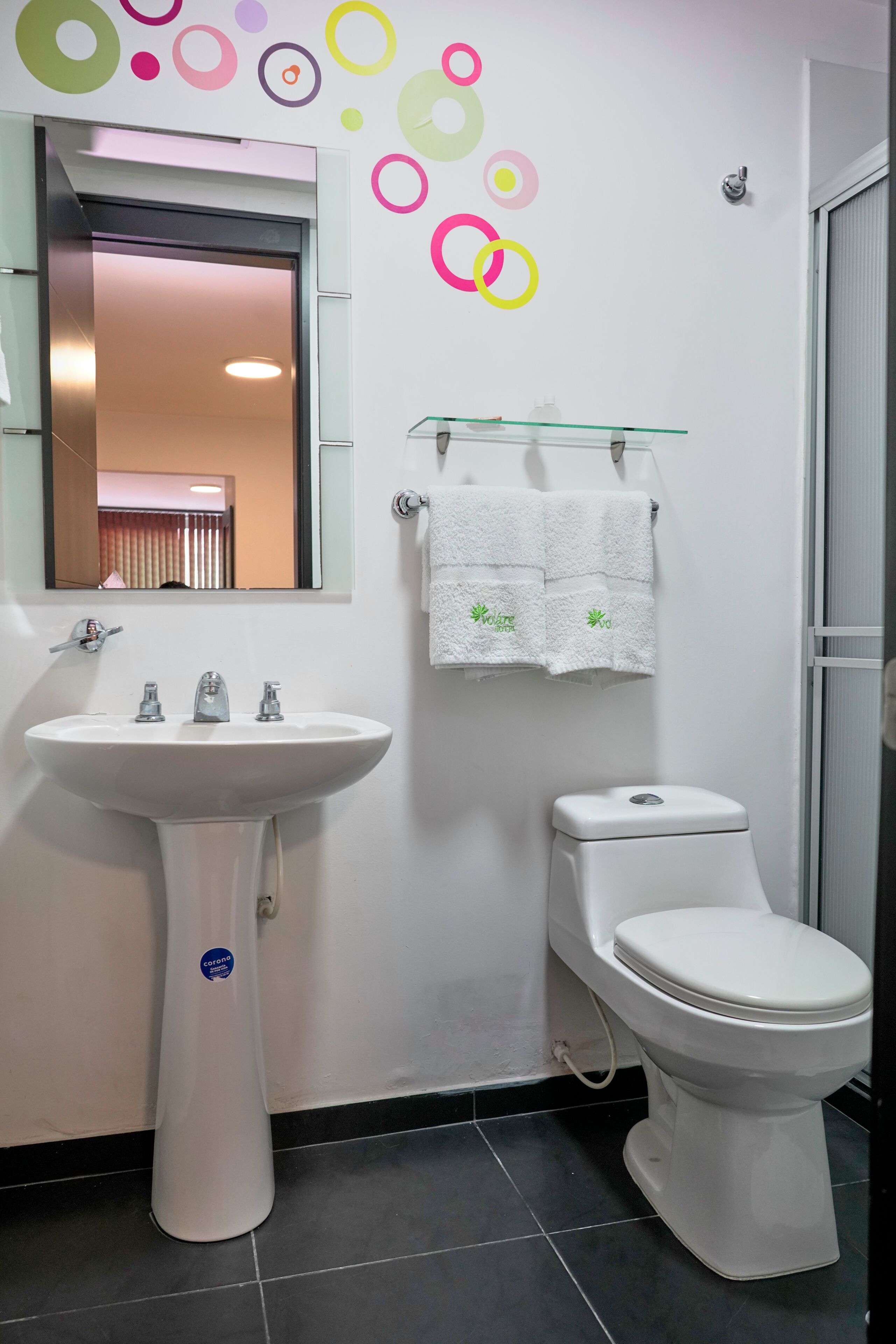 shower, designer toiletries, hair dryer, towels