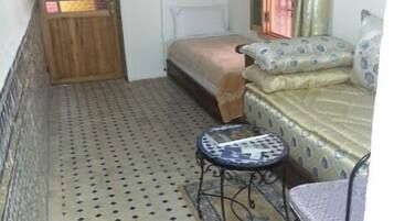 Family Quadruple Room, Private Bathroom | Living area | 32-inch LED TV with satellite channels, TV