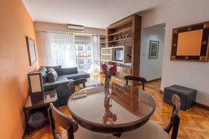 Standard Apartment, 1 Bedroom | Living area | 32-inch LCD TV with cable channels, TV, pay films