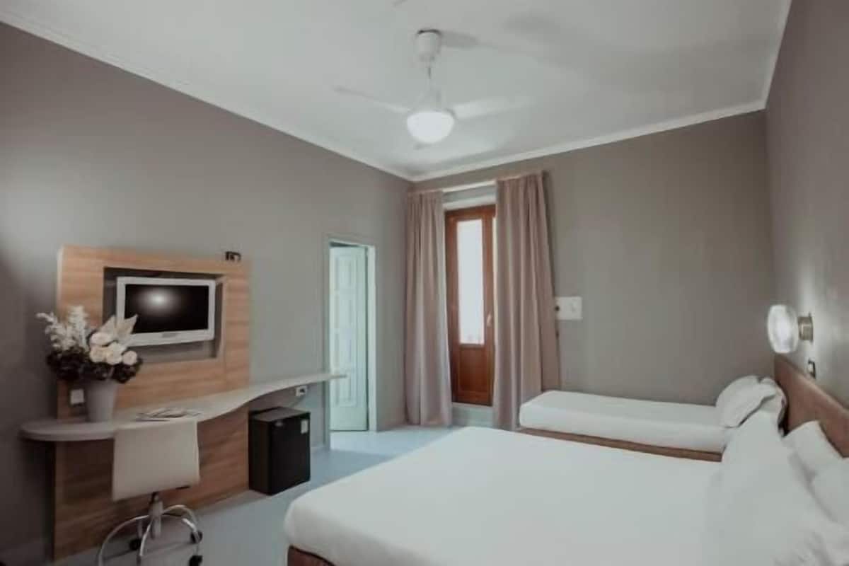 Desk, blackout drapes, free WiFi, bed sheets