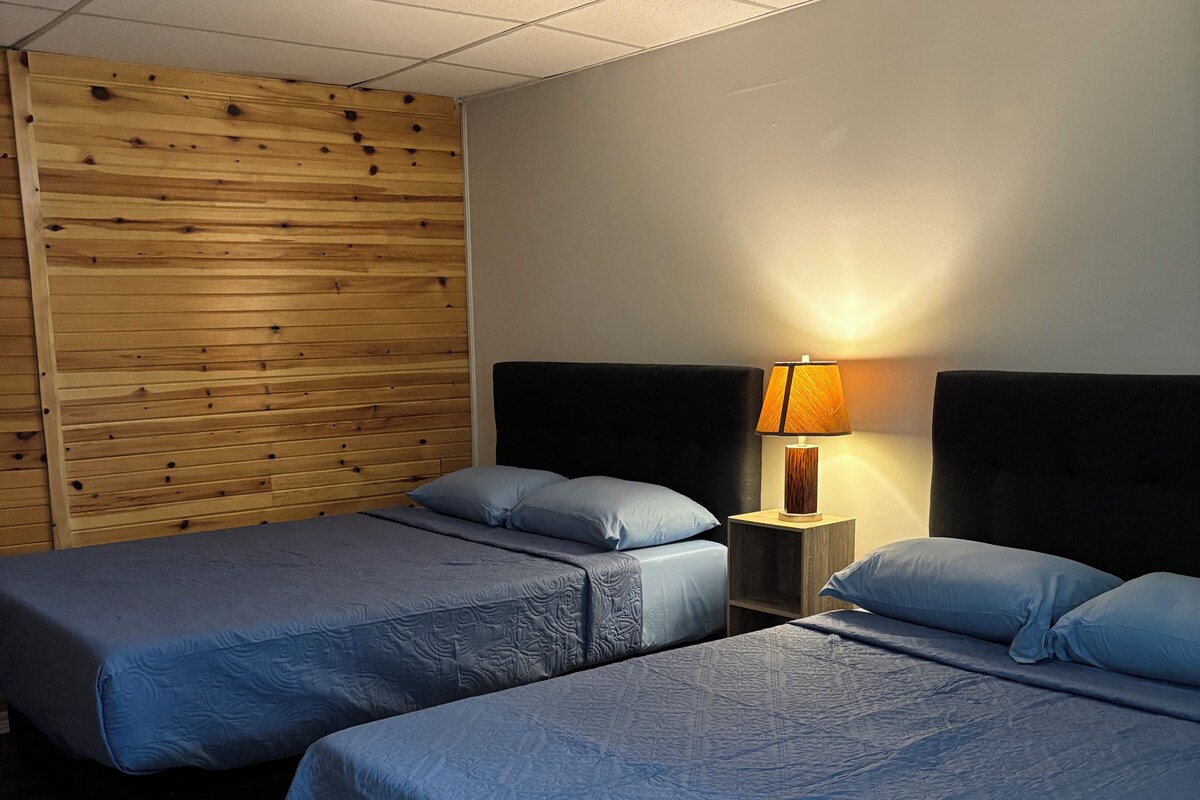 Quadruple Room, 2 Queen Beds | Iron/ironing board (on request), WiFi (free), individually decorated