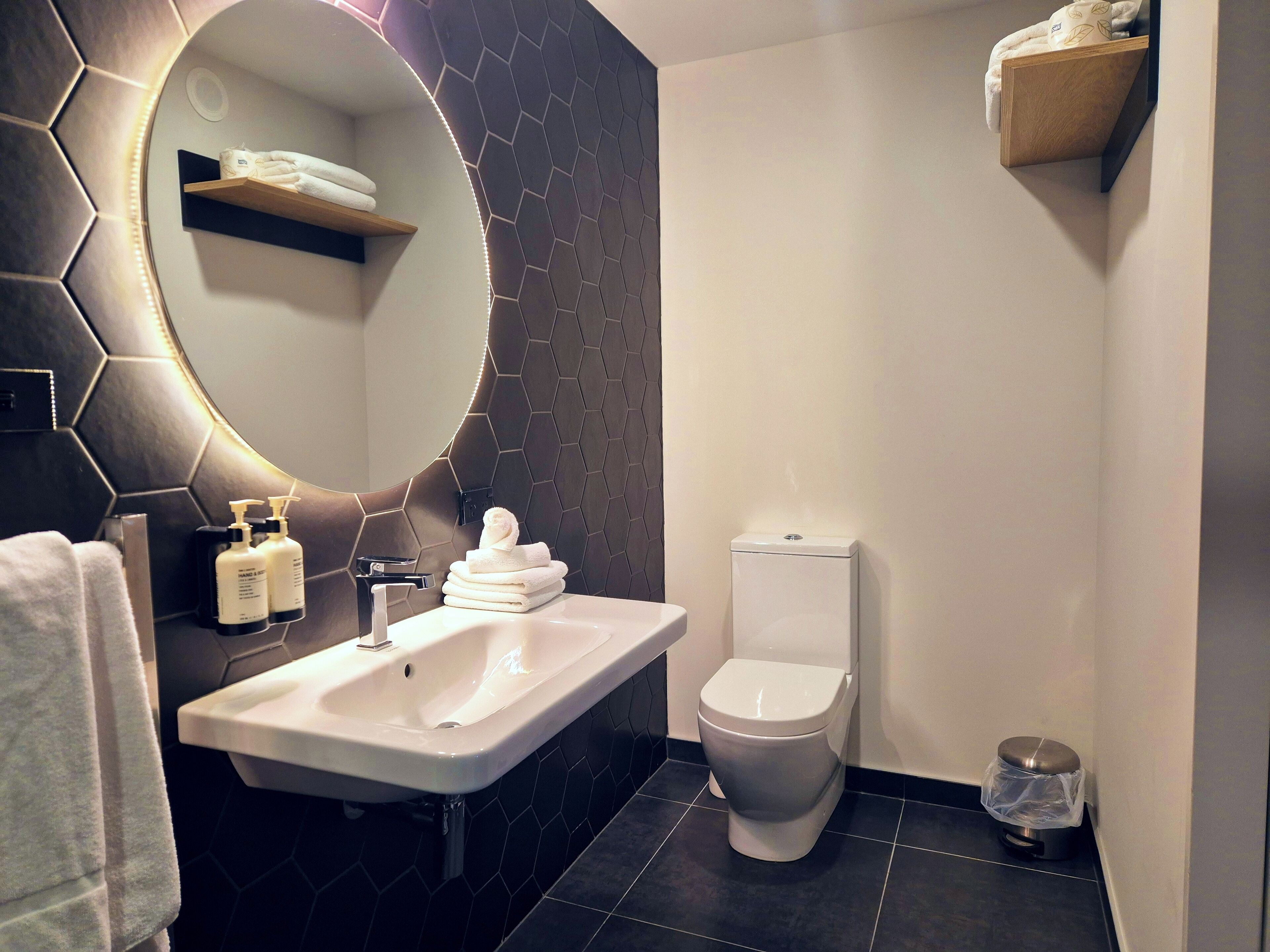 premium room, 1 king bed | bathroom | shower, hair dryer, towels