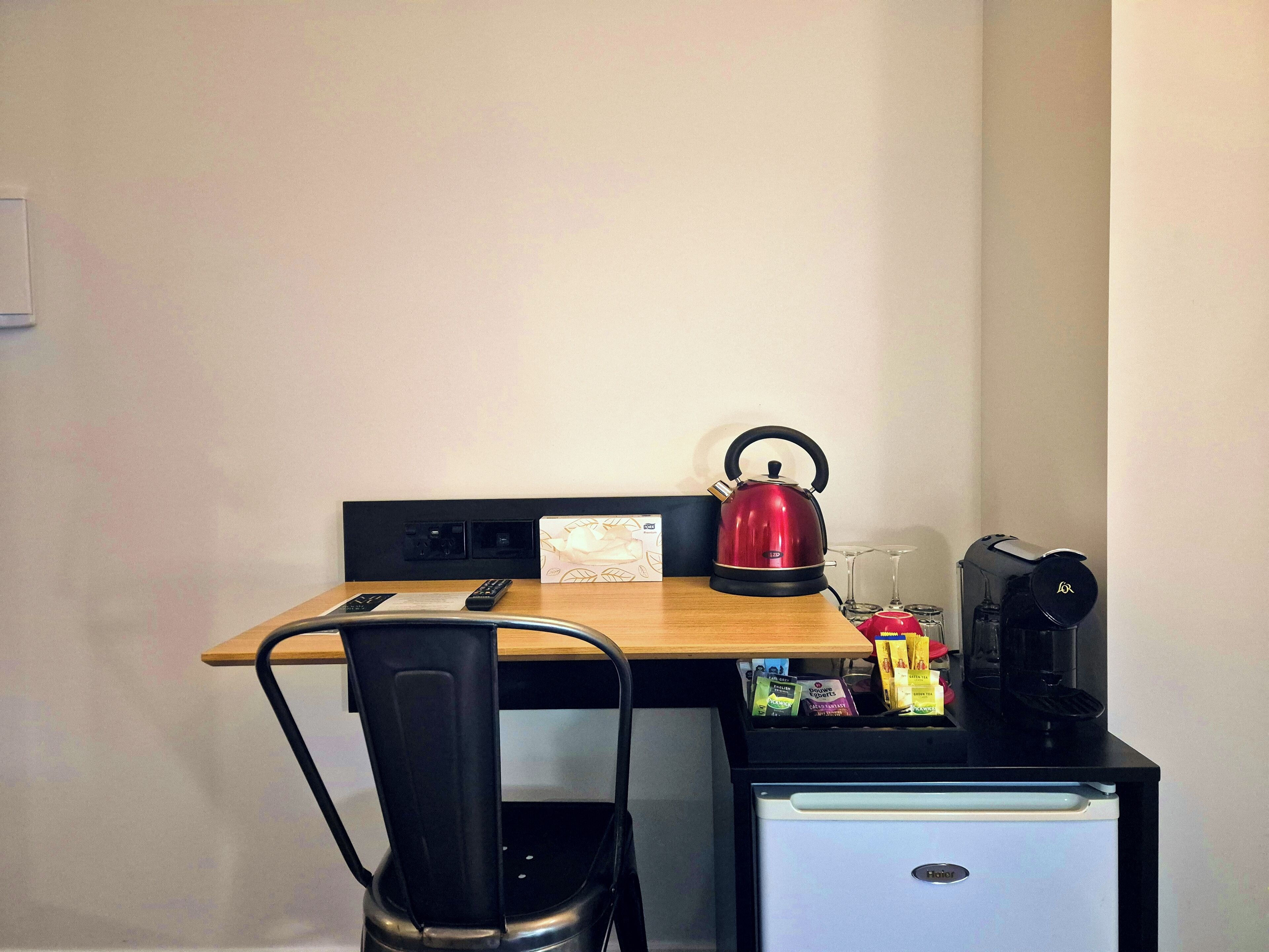 premium room, 1 king bed | living area | 40-inch tv with digital channels