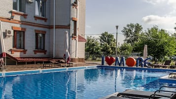 Outdoor pool, pool loungers