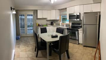 Family Cottage, 3 Bedrooms | Private kitchen | Fridge, microwave, coffee/tea maker, freezer