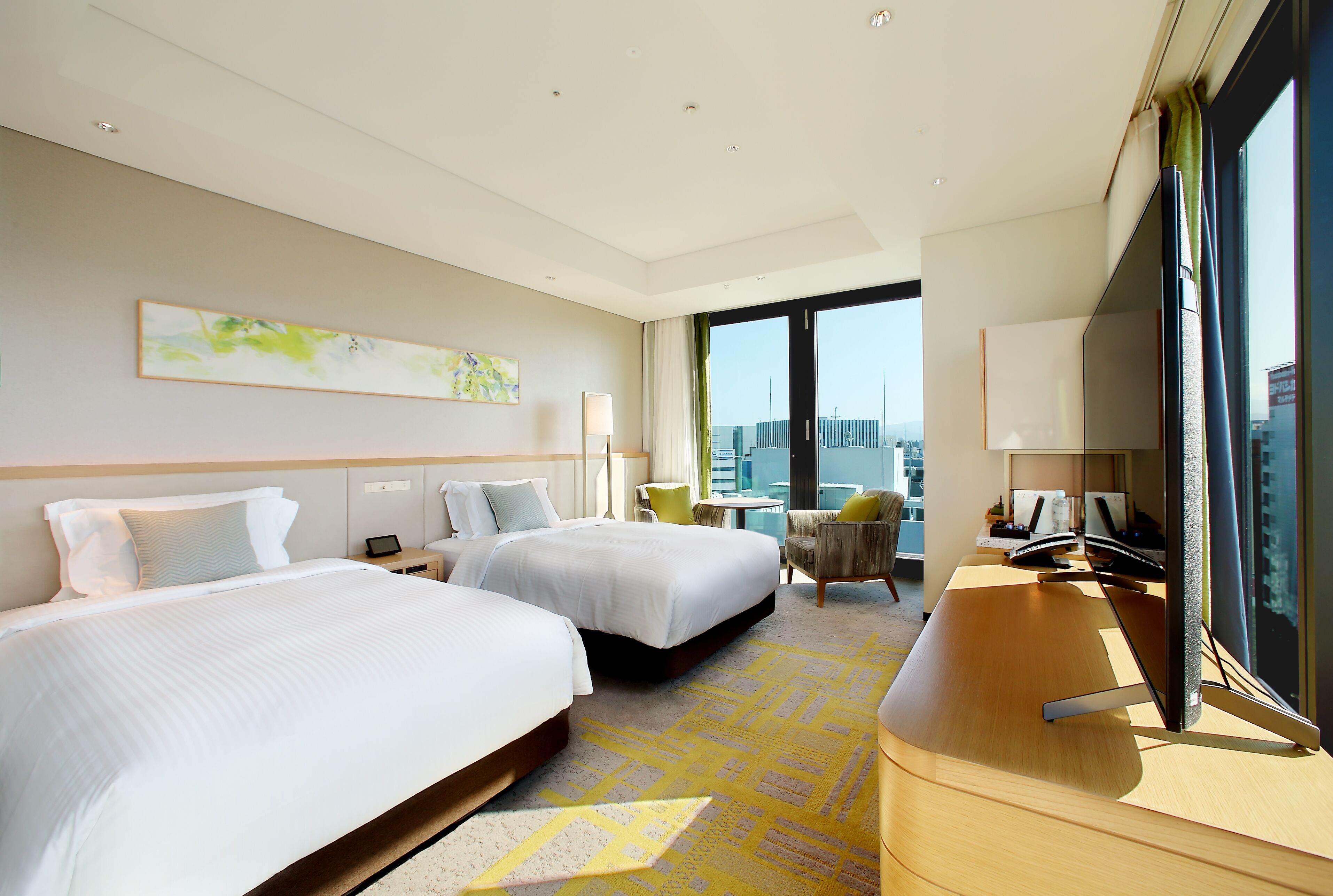 Down duvets, pillow-top beds, in-room safe, desk