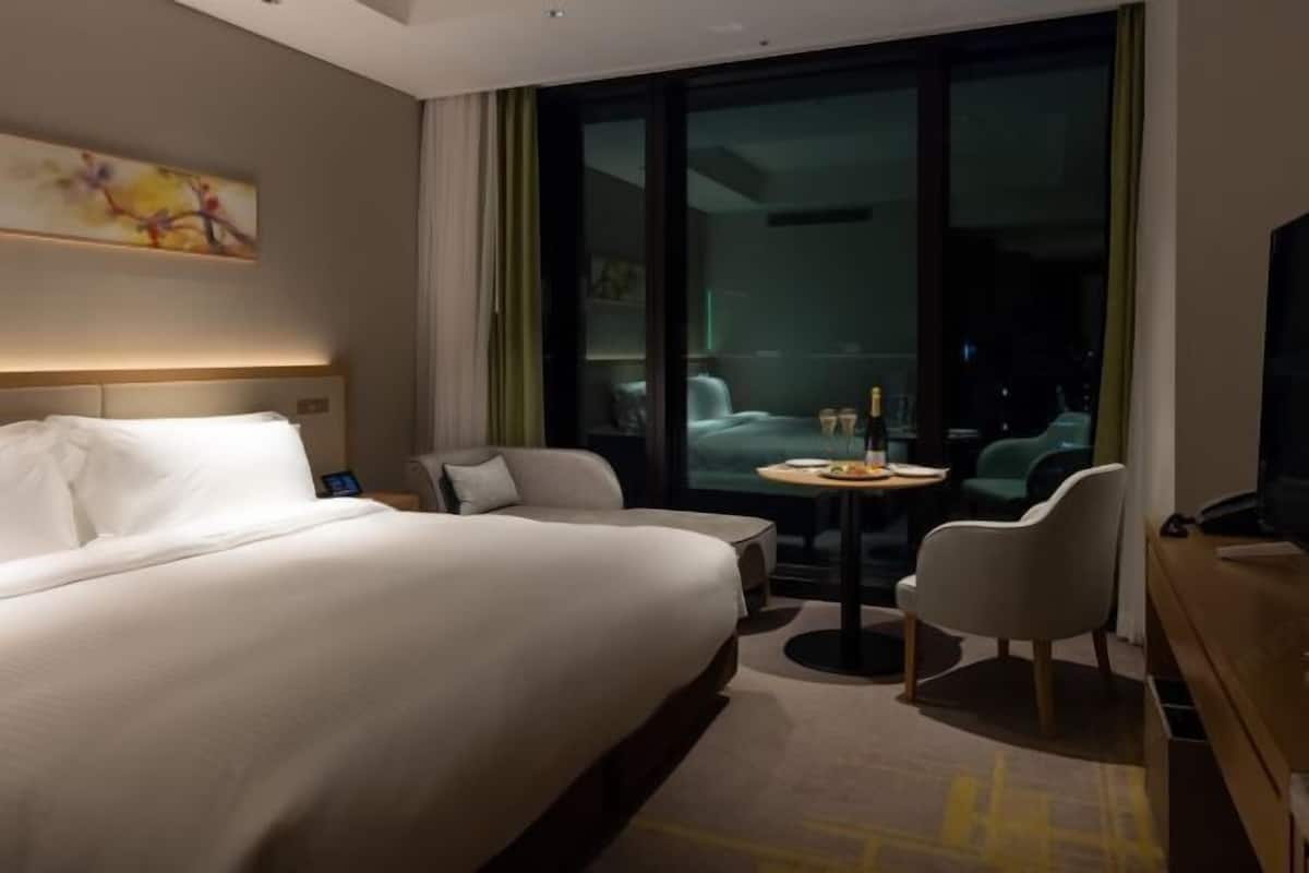 Down duvets, pillow-top beds, in-room safe, desk