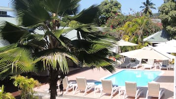 Outdoor pool, pool umbrellas, pool loungers