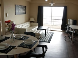 Superior Apartment, 2 Bedrooms, Patio, Sea View | Living area | TV