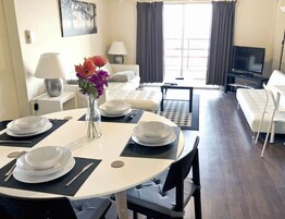 Superior Apartment, 2 Bedrooms, Patio, Sea View | Living area | TV