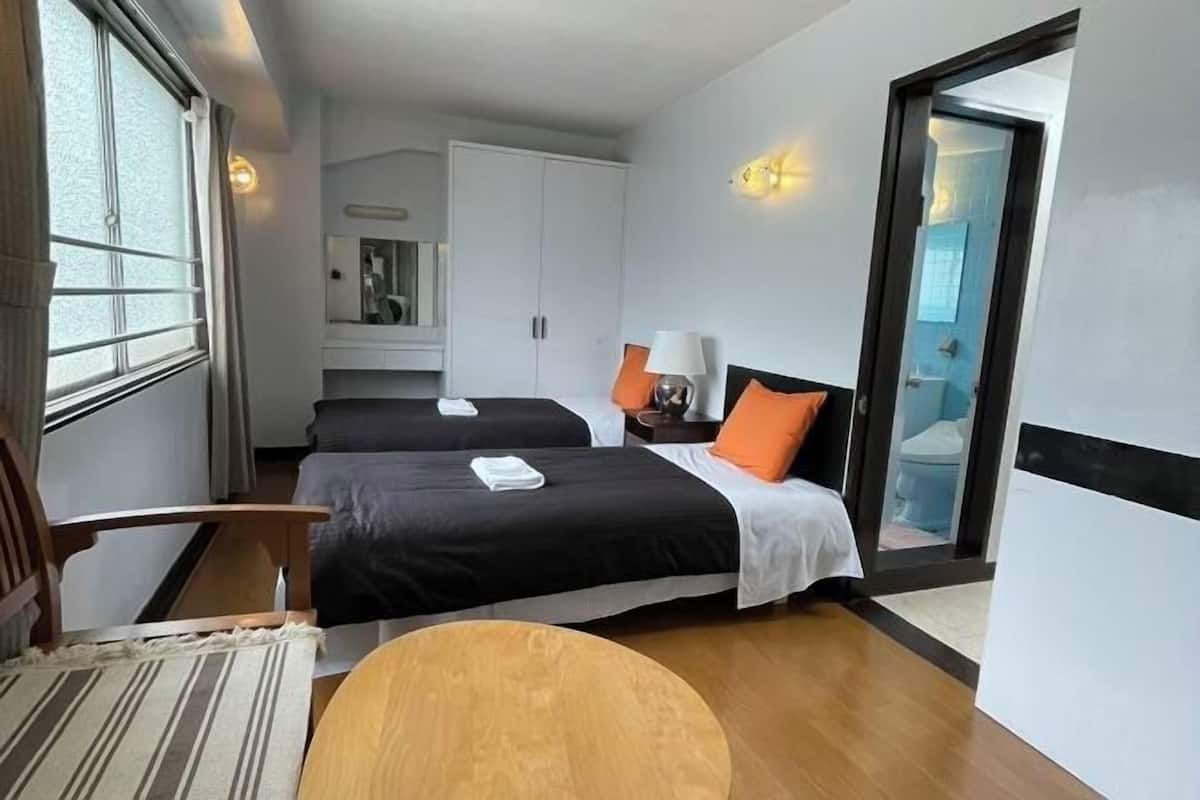 2 bedrooms, individually decorated, individually furnished, desk