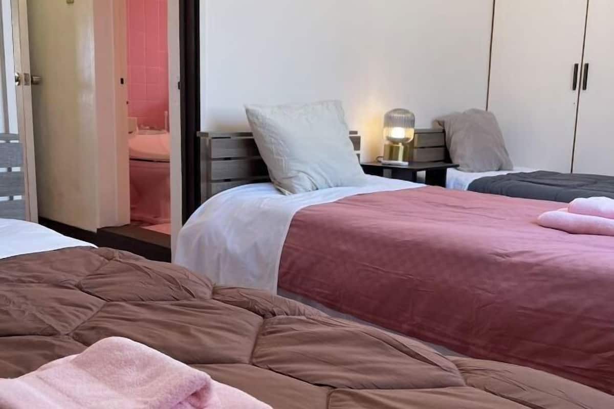 2 bedrooms, individually decorated, individually furnished, desk