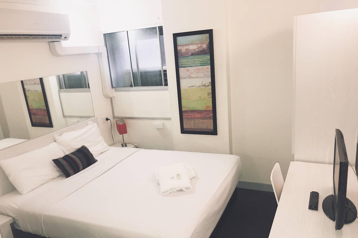 Desk, laptop workspace, free WiFi, bed sheets