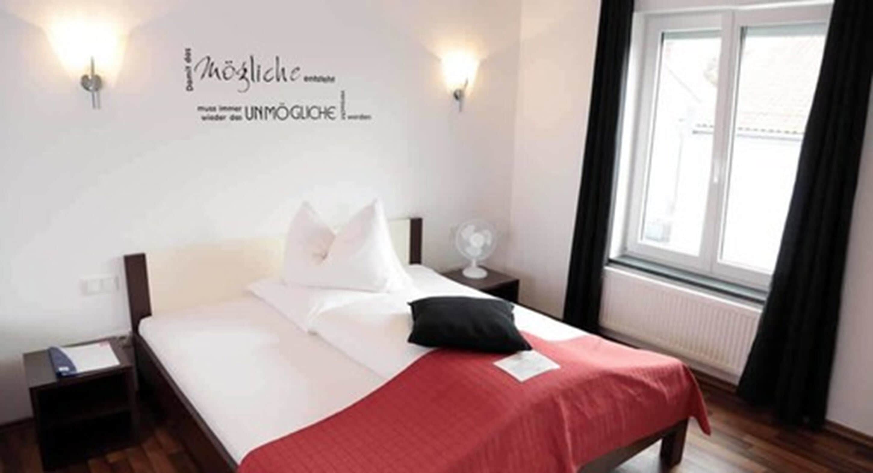 standard single room | minibar, in-room safe, desk, blackout curtains