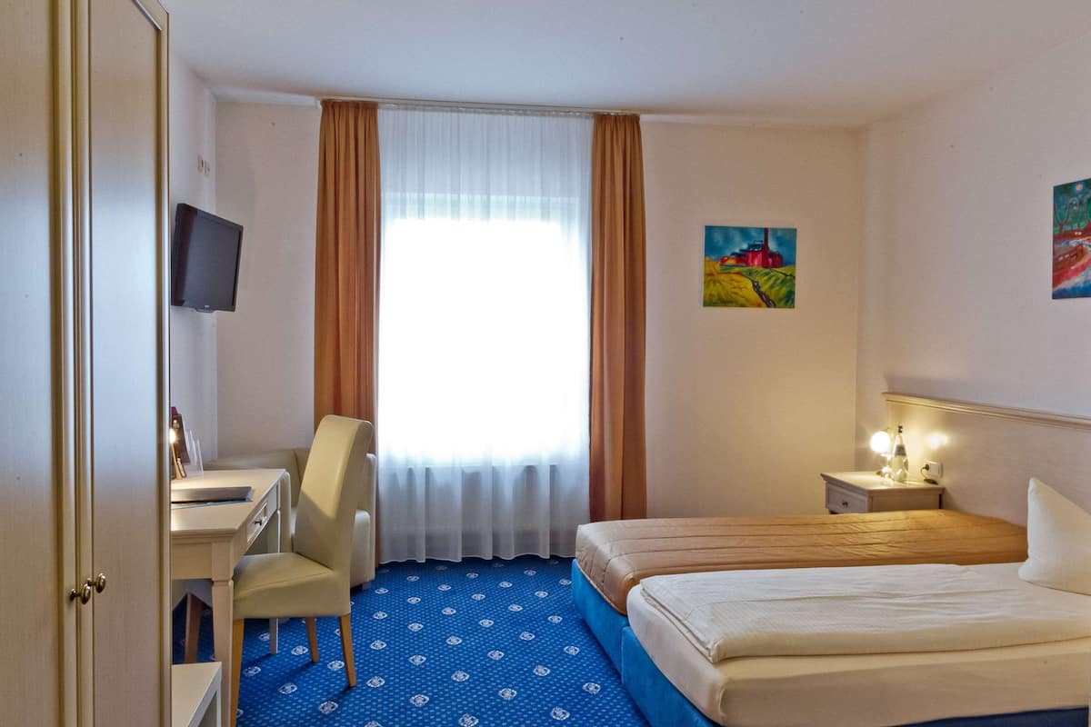 Coffres-forts dans les chambres, Wi-Fi gratuit, draps fournis