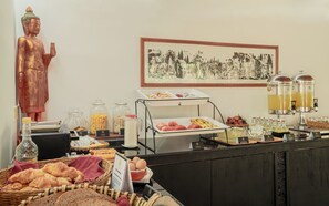 Daily buffet breakfast (USD 7.50 per person)