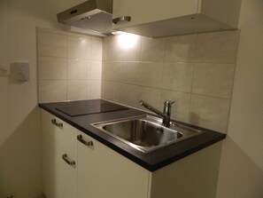Apartment | Private kitchen | Fridge, microwave, stovetop, electric kettle