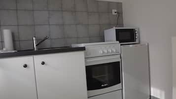 Apartamento | Cozinha privada | Cooktop