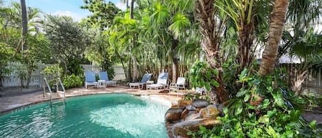 Outdoor pool, open 8:00 AM to 7:00 PM, pool umbrellas, sun loungers