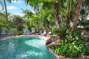 Outdoor pool, open 8:00 AM to 7:00 PM, pool umbrellas, pool loungers