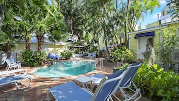 Outdoor pool, open 8:00 AM to 7:00 PM, pool umbrellas, sun loungers