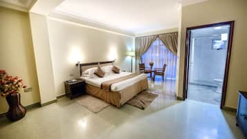Suite Deluxe, 1 dormitori, vistes al pati | 1 dormitori, roba de llit d'alta qualitat i minibar