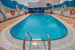 Outdoor pool, pool loungers