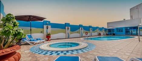 Outdoor pool, sun loungers