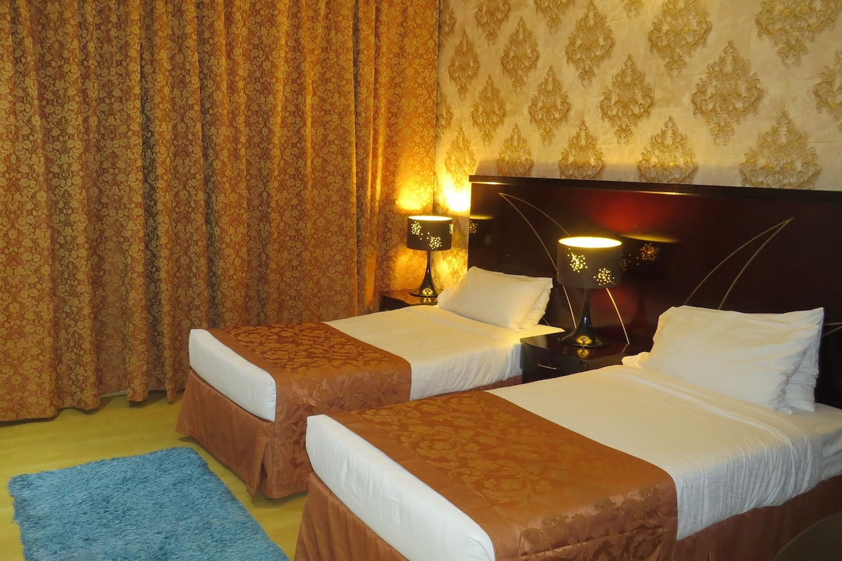 Apartment, 2 Bedrooms | Minibar, in-room safe, iron/ironing board, free cots/infant beds