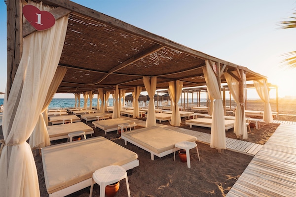 Private beach, sun loungers, beach umbrellas, beach towels