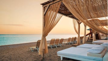 Private beach, sun loungers, beach umbrellas, beach towels