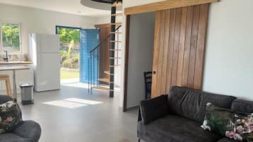 Family Duplex | Living area | 55-inch flat-screen TV with cable channels, TV