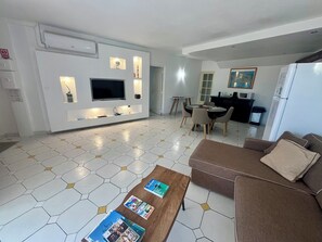 Apartment, 2 Bedrooms, Pool View | Living area | 55-inch flat-screen TV with cable channels, TV - Colombus Résidence (Oyster Pond)