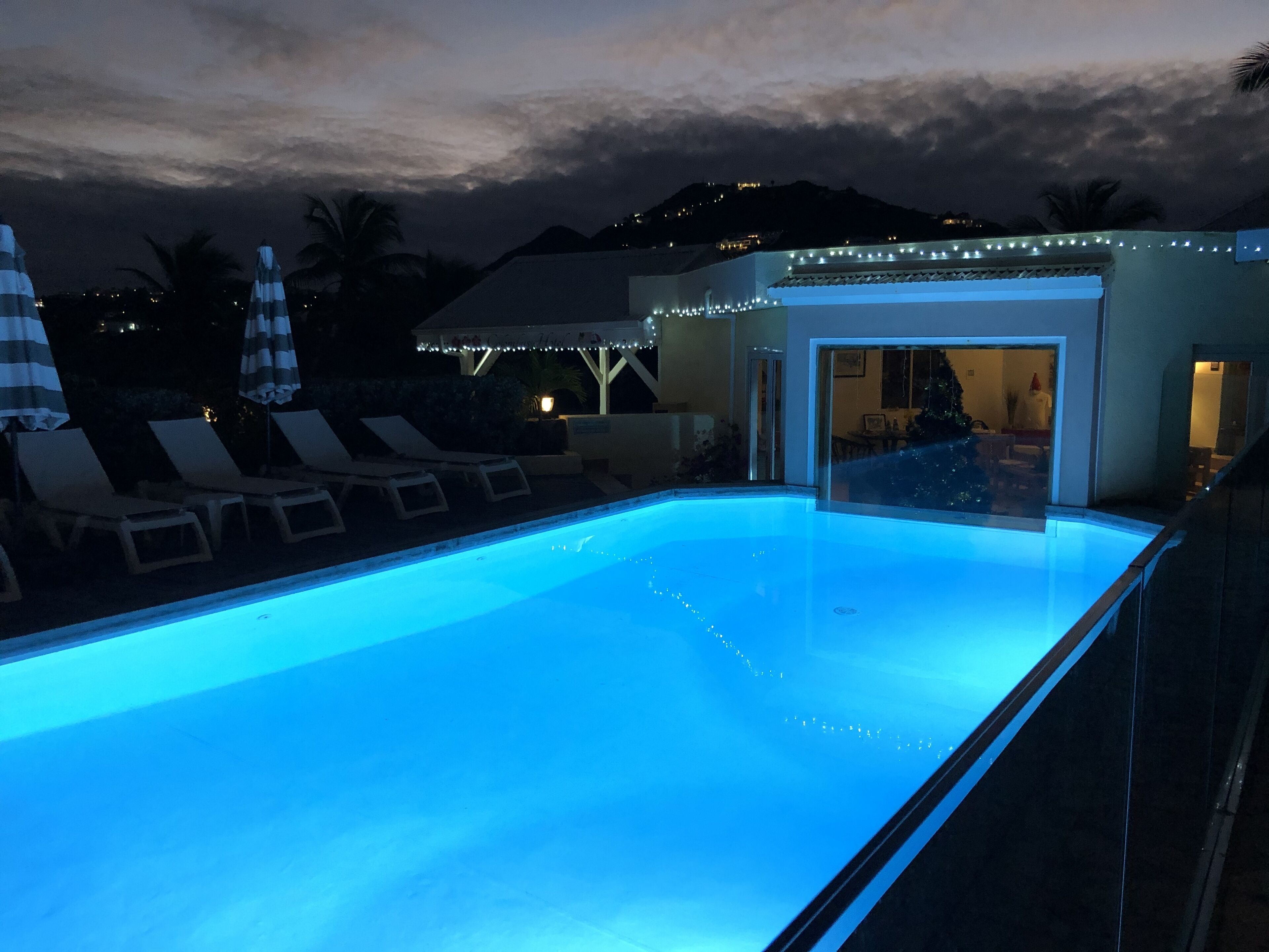 outdoor pool, pool umbrellas, pool loungers