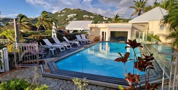 Outdoor pool, pool umbrellas, pool loungers