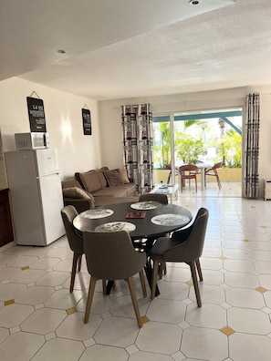 Apartment, 2 Bedrooms, Pool View | Living area | 55-inch flat-screen TV with cable channels, TV - Colombus Résidence (Oyster Pond)