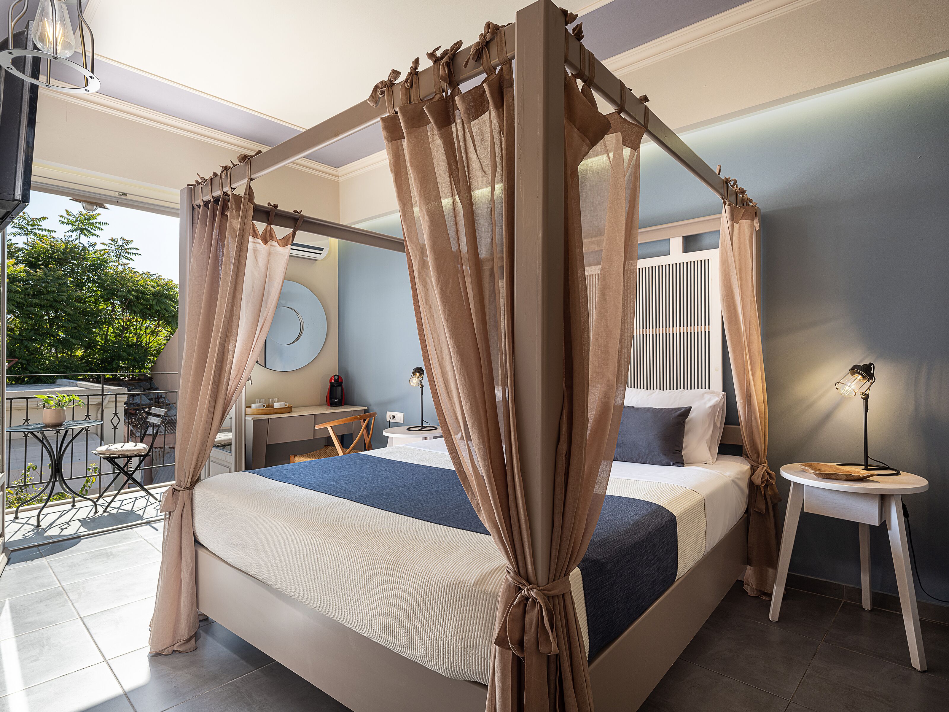 Deluxe Room with Balcony and Hot Tub | 1 bedroom, down comforters, in-room safe, individually decorated