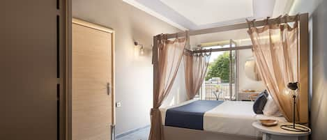 Deluxe Room with Balcony and Hot Tub | 1 bedroom, down duvets, in-room safe, individually decorated