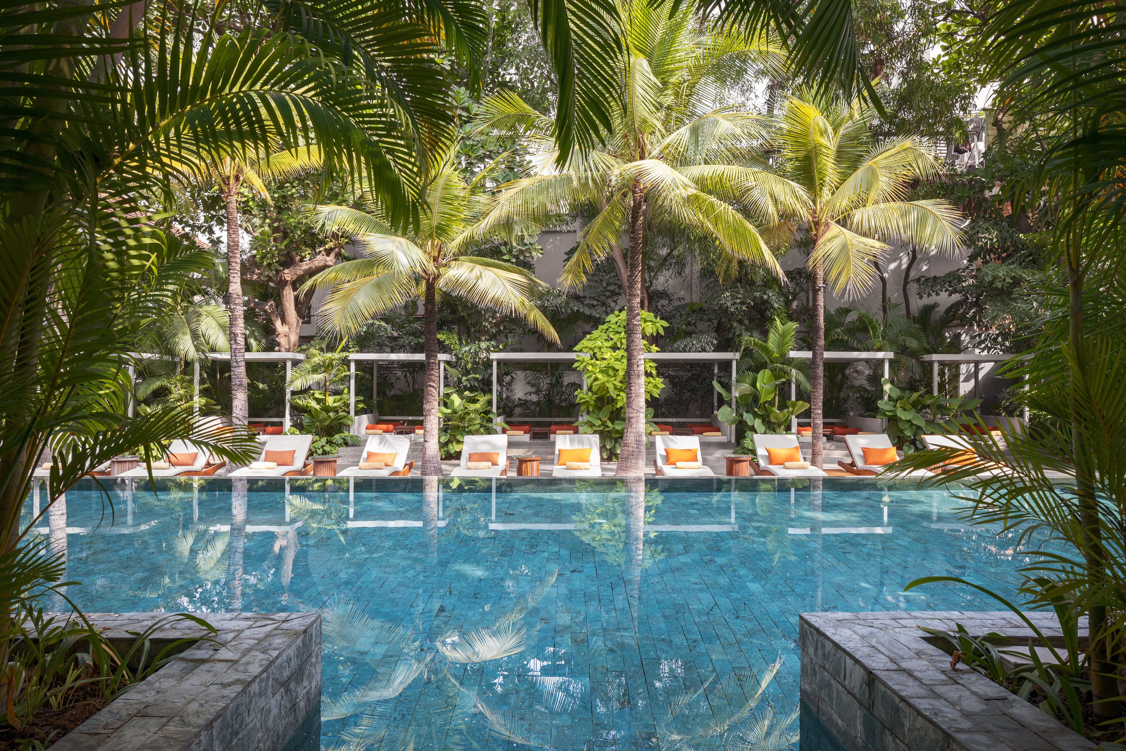 2 outdoor pools, open 8:00 AM to 9:00 PM, free cabanas, pool umbrellas